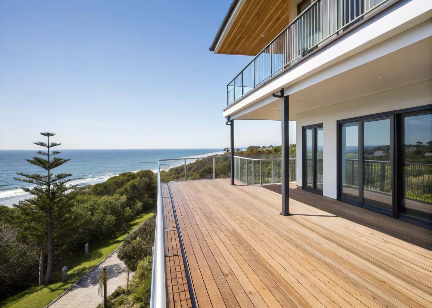 balcony construction Newcastle — Merewether completed timber balcony with ocean view